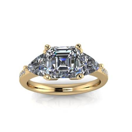 1.5 ct approx asscher cut three stone in yellow gold